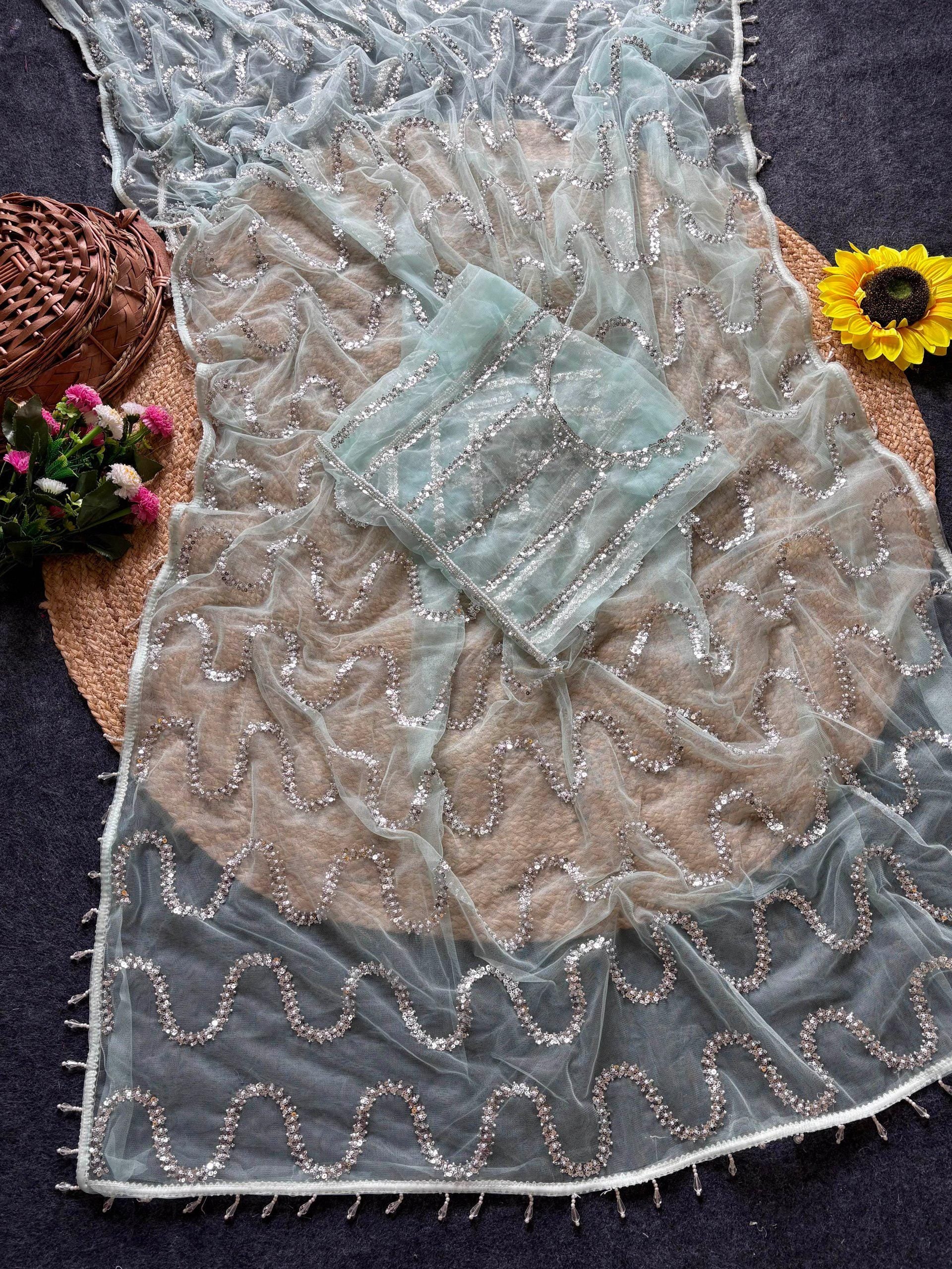 White Soft Net Saree with Beadwork & Cutwork Border