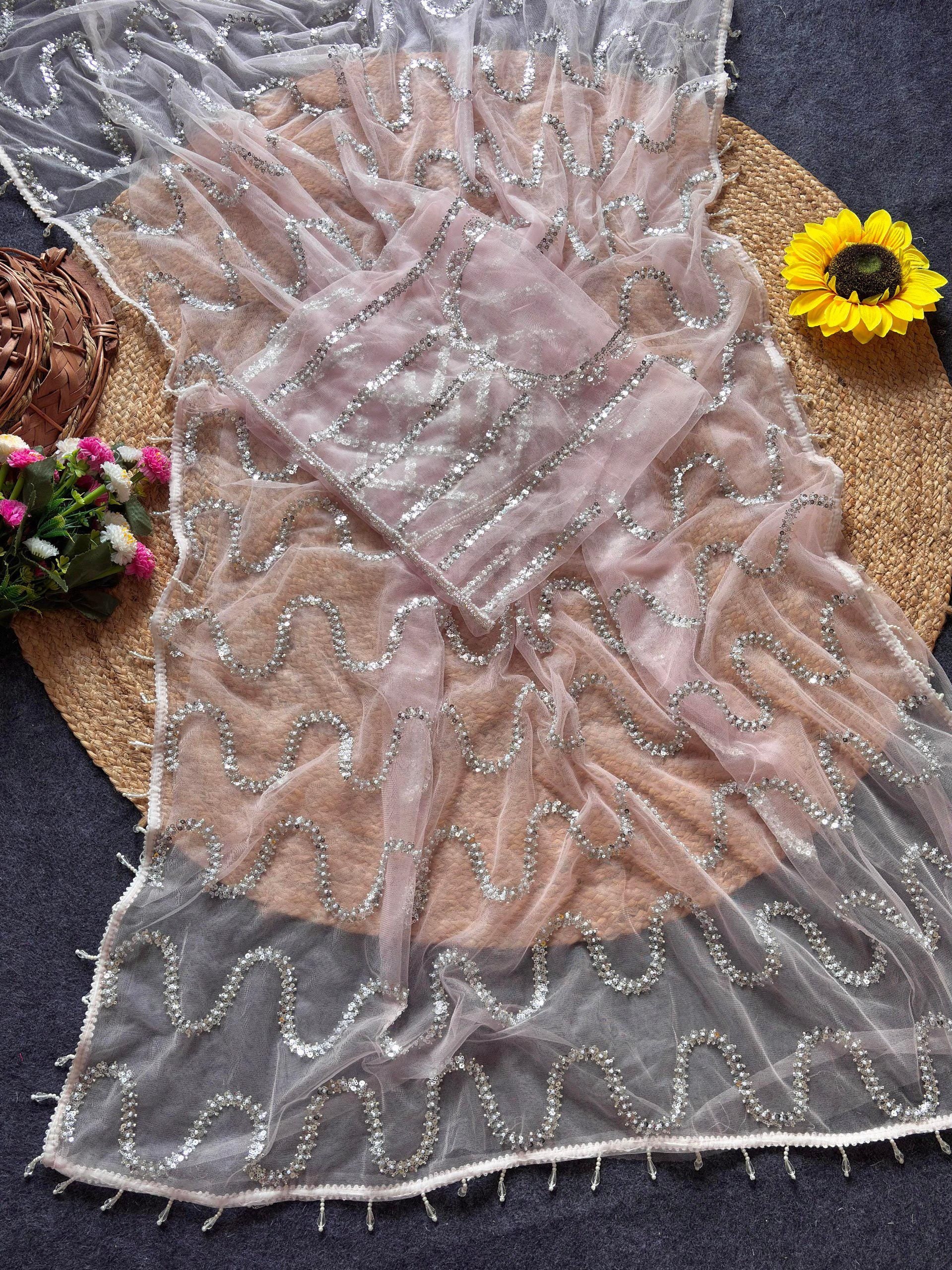 White Soft Net Saree with Beadwork & Cutwork Border