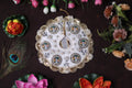 White Shrinathji Embroidered Laddu Gopal Dress with Elegant Golden Ruffled Lace Border Janmashtami and Festive Puja Wear