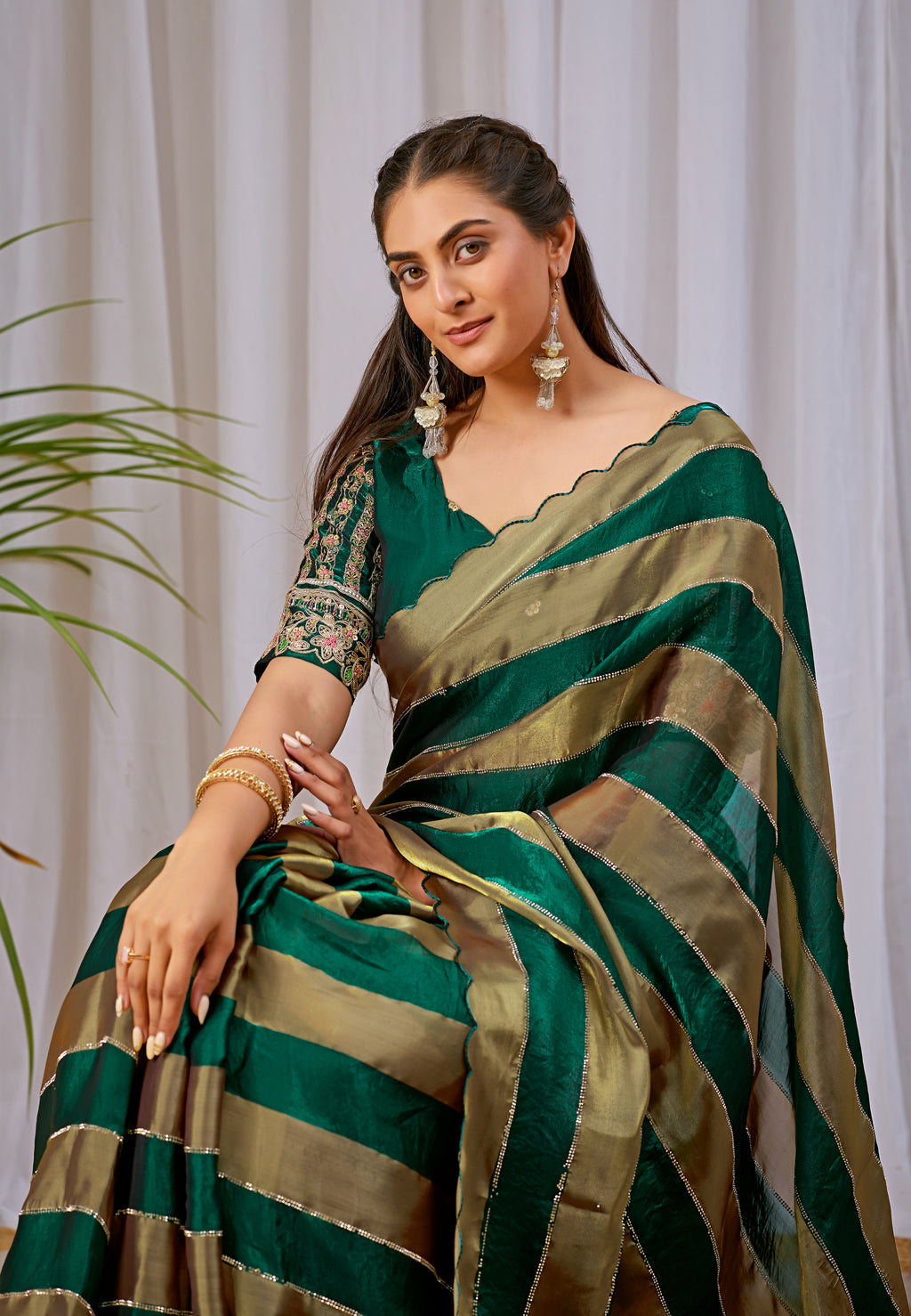 NAYANTARA Satin Embellished Embroidered Saree - Bottle Green